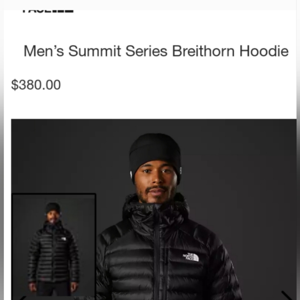 Black North face down jacket with a hoodie